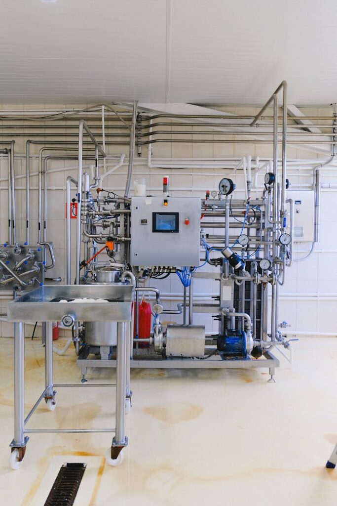 Detailed view of complex industrial machinery in a modern factory environment.